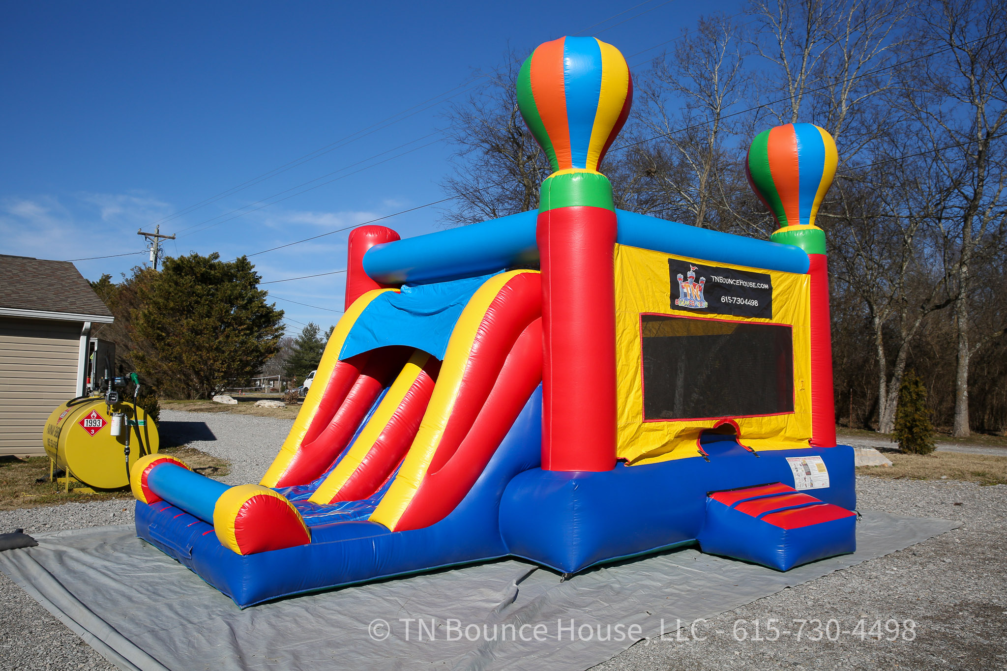 Bounce house rental setup in Thompson's Station TN backyard
